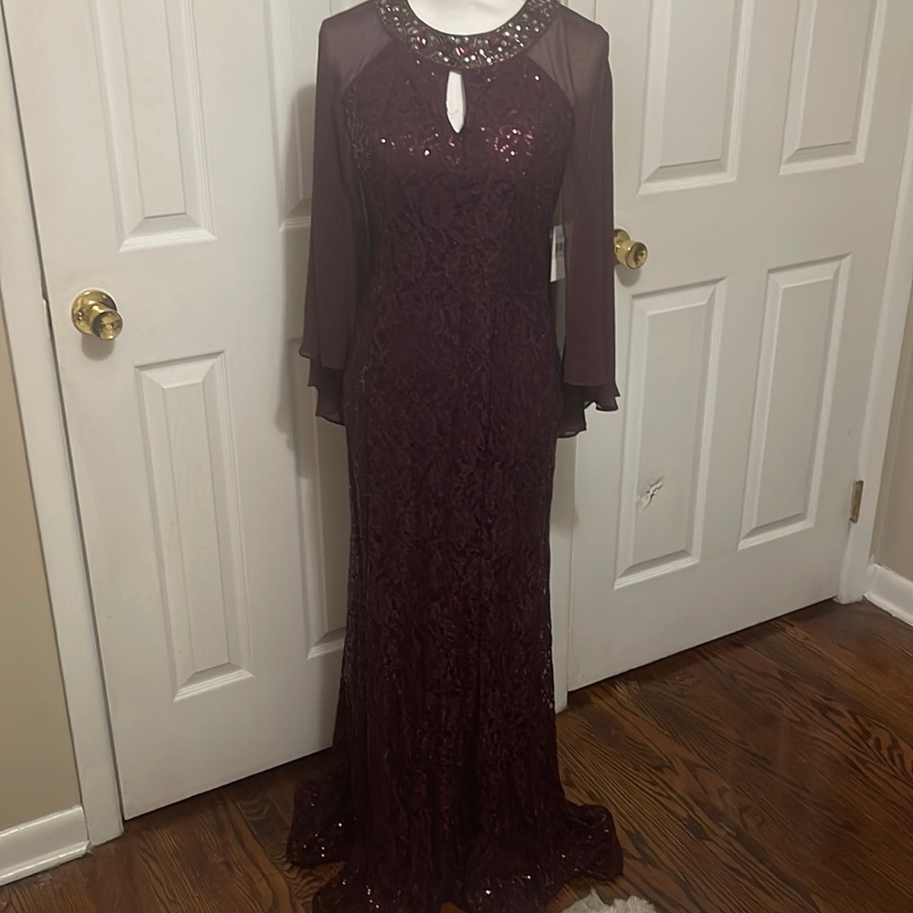 Full length evening gown with embellished neckline